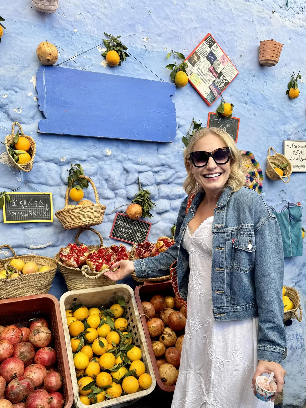 Julie Hartigan at a produce stand in Chefchaouen