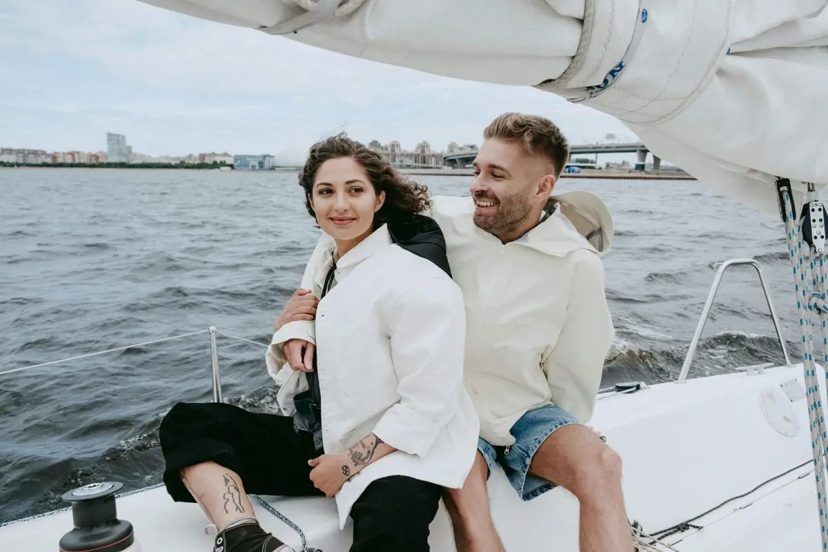 A couple on a sailboat